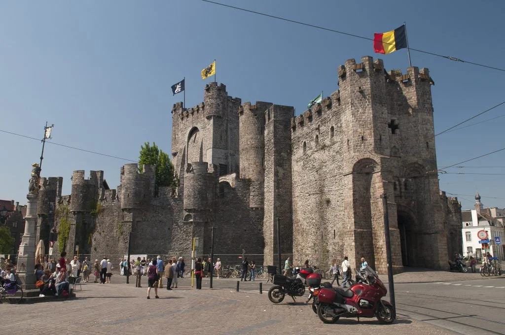 Visiting tourists surrounding Gravensteen Castle. 